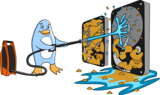 Freedo points a pressure cleaner's water jet at a couple of very dirty giant hard drives. Image by Jason Self from https://jxself.org/git/?p=freedo.git.